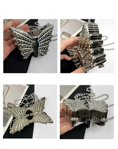 Detailed views of silver butterfly clutch bag with crystal rhinestones and chain strap