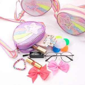 Sparkly glitter heart-shaped crossbody bag for girls with rainbow stripes and star detail