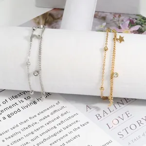 Elegante bracciale a doppio strato in acciaio inossidabile con ciondoli stella e luna