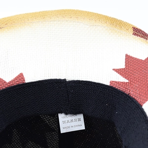 Detail of western straw hat interior featuring a 100% paper material label and sweatband