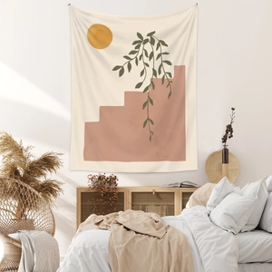 Détail d'une tapisserie bohème avec soleil abstrait et plantes sur le mur de la chambre