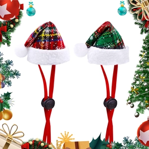 Festive red and green plaid Christmas pet hat with adjustable strap and plush pom-pom