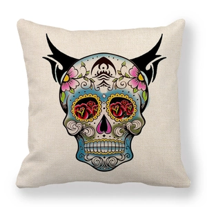 Macro detail of Bohemian colorful sugar skull print on textured linen cushion cover