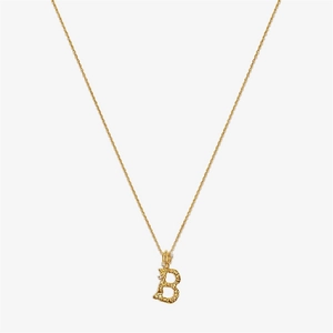 Close-up of golden letter B pendant with lava texture and sparkling cubic zirconia stones