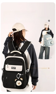 Detail of wide curved shoulder straps on lightweight school backpack for comfort
