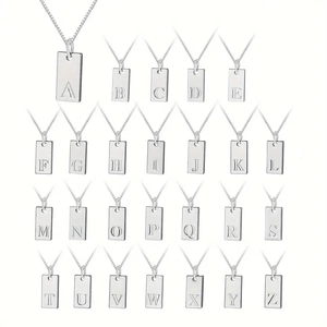 Grid layout showing 26 silver rectangle pendants with engraved letters A to Z on fine chains