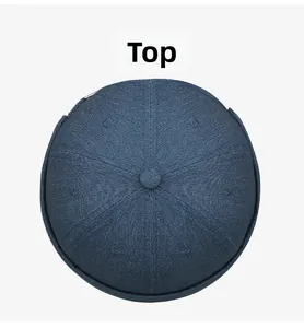 Top view of deep blue denim dock hat with six-panel stitching and central fabric button