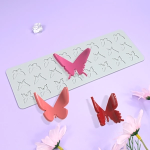 Butterfly lace silicone mold for fondant and chocolate cake decoration shown with 3D butterflies