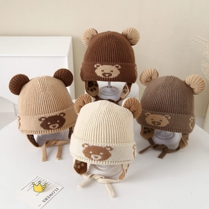 Winter knit bear hats with earflaps and tie straps for kids in brown and cream tones