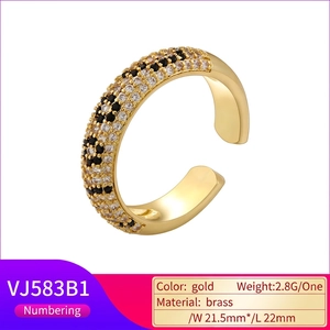 Adjustable brass ring with leopard pattern micro-pave cubic zirconia stones in gold finish