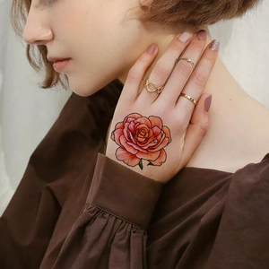 3D red rose flower temporary tattoo sticker for women on hand with green leaves