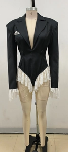 Detail of V-neck bodysuit blazer with white lace trim on sleeves and hemline