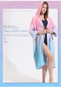 Detail of quick-drying hooded beach cloak with pink and blue gradient design and zipper