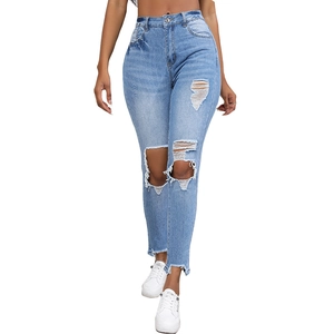 Women high waisted light blue distressed jeans with slim fit and ripped knee detail
