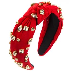 Serre-tête rouge en tissu avec nœud et strass scintillants sertis de métal doré