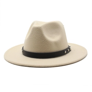 Detail view of beige wool fedora featuring a black leather band with silver metal studs