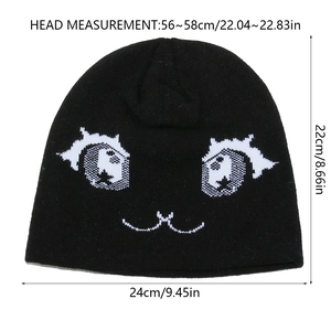 Détails de taille d'un bonnet en maille Y2K noir avec yeux de cartoon et broderie chat