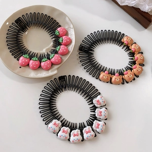 Three black plastic hair combs for kids featuring cute strawberry, bear, and bunny charms