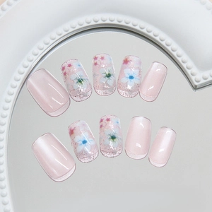 Press-on nails with camellia floral design and glitter cat eye finish in square shape