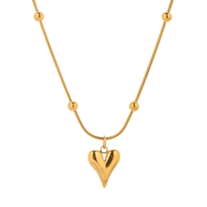 Polished gold heart pendant necklace with beads on a sleek snake chain for women