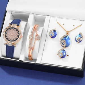 Women's rose gold and navy watch gift set with crystal jewelry and rotating dial