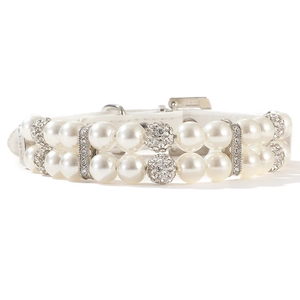 Detailed view of double-row pearl pet collar with crystal balls and white leather strap