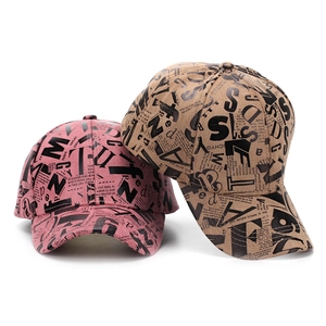 Pink and khaki digital alphabet print baseball caps with all-over vintage news style