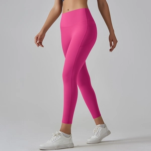 Detail of rose pink high-waist yoga leggings with side seams and four-needle six-thread stitching