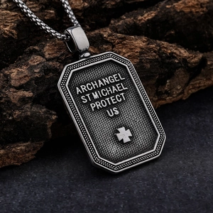 Stainless steel St. Michael archangel shield pendant with prayer on rustic wood