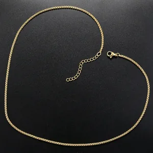 Detailed close-up of 18K gold-plated popcorn chain with lobster clasp and extender