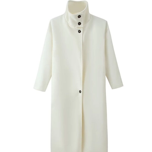 Elegant cream wool-blend coat with stand collar and dark resin buttons in a minimalist style