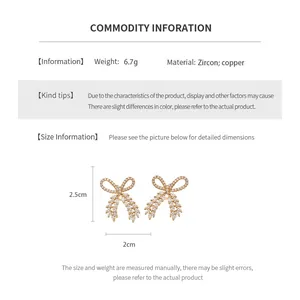 Size guide for zircon bow earrings featuring 2.5cm height and 2cm width data