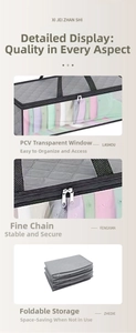 Macro detail of foldable gray organizer with PVC window, zipper and diamond pattern fabric