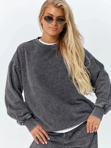Detail showing the vintage washed texture and premium stitching of the grey cotton sweatshirt