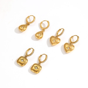 Gold stainless steel earrings featuring heart, drop, and square charms with star engraving