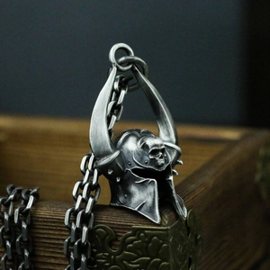Vintage gothic skull mask pendant in antique silver finish with a 60cm heavy chain link