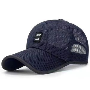 Navy blue breathable mesh baseball cap with curved brim and embroidered logo patch