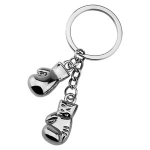 Polished silver 3D metal boxing glove keychain with dual pendant design on white background