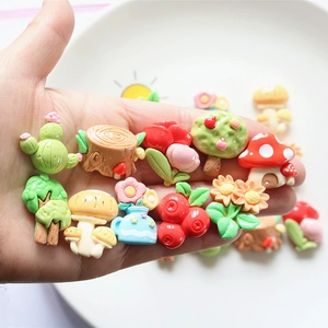 Resin DIY accessories featuring flowers, mushrooms, and trees for hair clips and decor