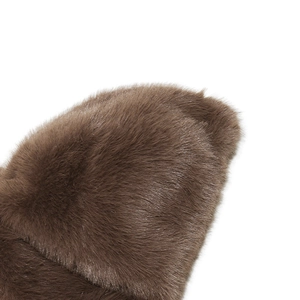 Close-up of soft faux mink fur texture with dark brown leopard pattern and glossy finish