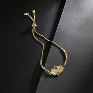 Detailed close-up of Hamsa Hand bracelet with colorful cubic zirconia and sliding clasp