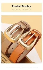 Close-up of faux leather belts with matte gold buckles in khaki and orange colors