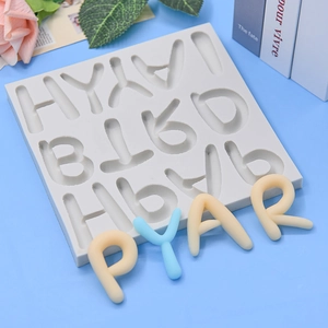 Silicone alphabet mold for DIY cake baking and crafts shown with pastel colored 3D letters
