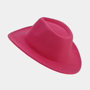 Detailed view of the rose pink wool felt western cowboy hat with wide curved brim