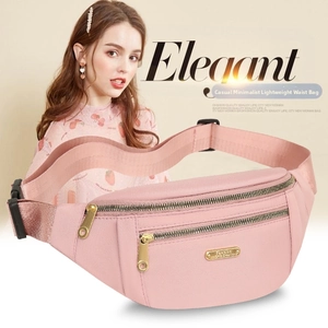 Close-up of pink nylon waist bag with double golden zippers and elegant metal logo