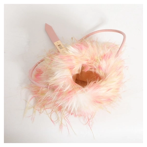 Detailed top view of pink and yellow plush handbag with pink leather handle and buckle