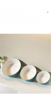 Three-piece set of nested bicolor washbasins in large, medium, and small sizes