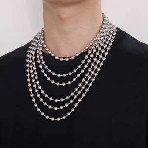 Detailed view of multi-layered stainless steel ball bead chain necklace in silver finish