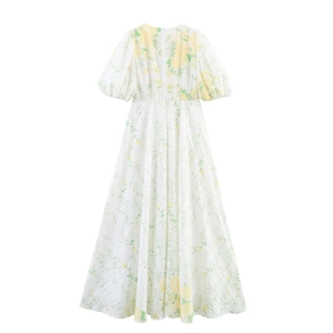 White eyelet floral dress with yellow embroidery, puff sleeves and a-line back view