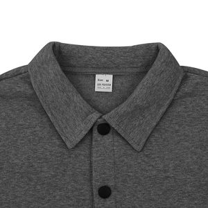 Detailed close-up of dark grey collar and label on heavy-duty tactical outdoor fleece jacket